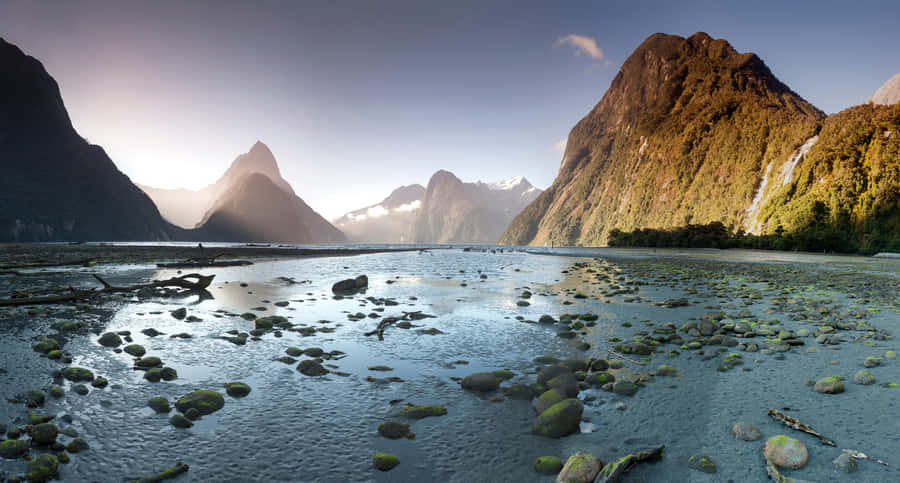 Majestic Landscape Of Milford Sound In New Zealand Wallpaper