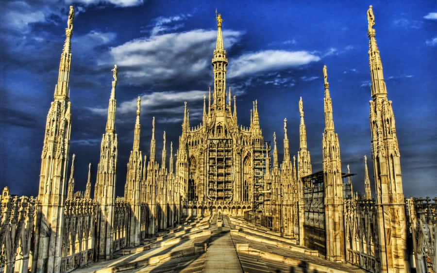 Majestic Milan Cathedral Under A Clear Sky Wallpaper