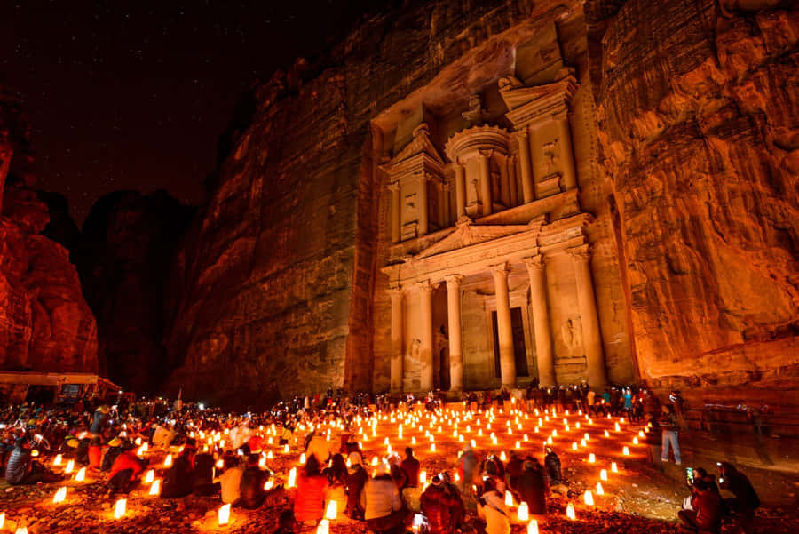 Majestic Night View Of The Treasury In Petra Wallpaper