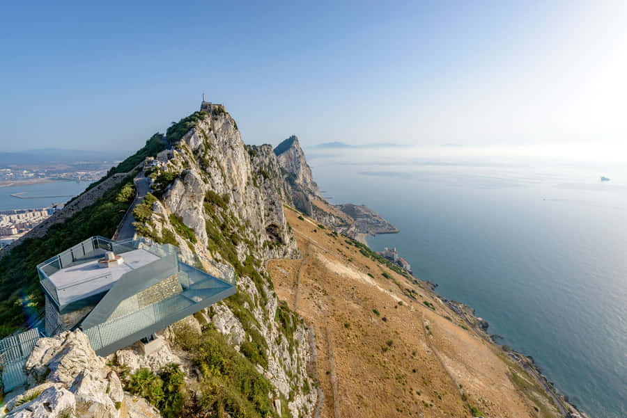 Majestic Rock Of Gibraltar Bathed In Bright Sunlight Wallpaper