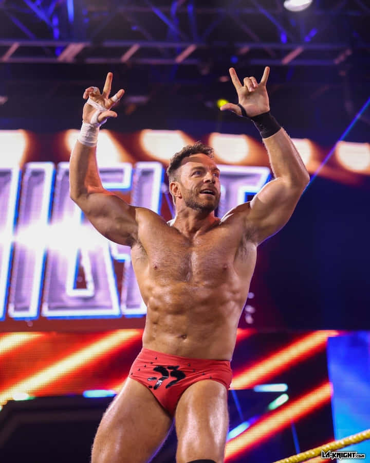 Majestic Silhouette Of La Knight Standing Tall Against The Sunset. Wallpaper