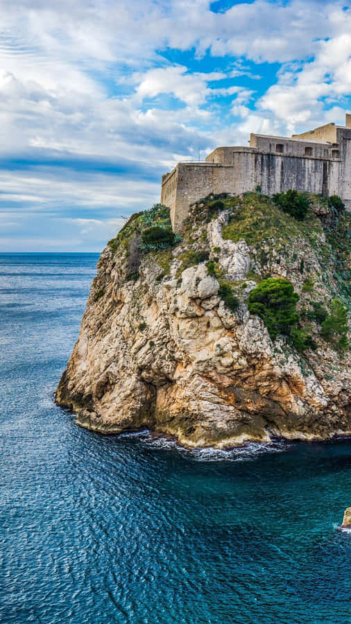 Majestic Twilight Over Dubrovnik’s Ancient Walls Wallpaper