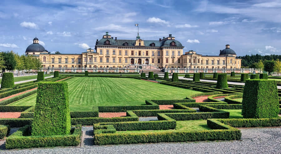 Majestic View Of Drottningholm Palace In Sweden Wallpaper