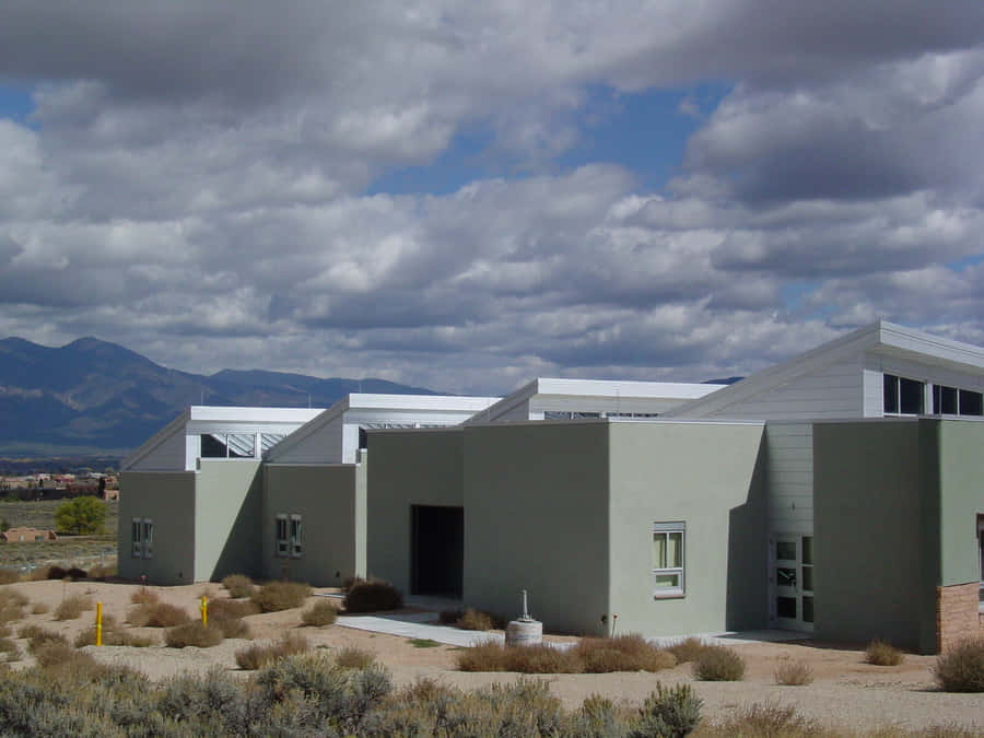 Majestic View Of Taos Pueblo Hall Wallpaper