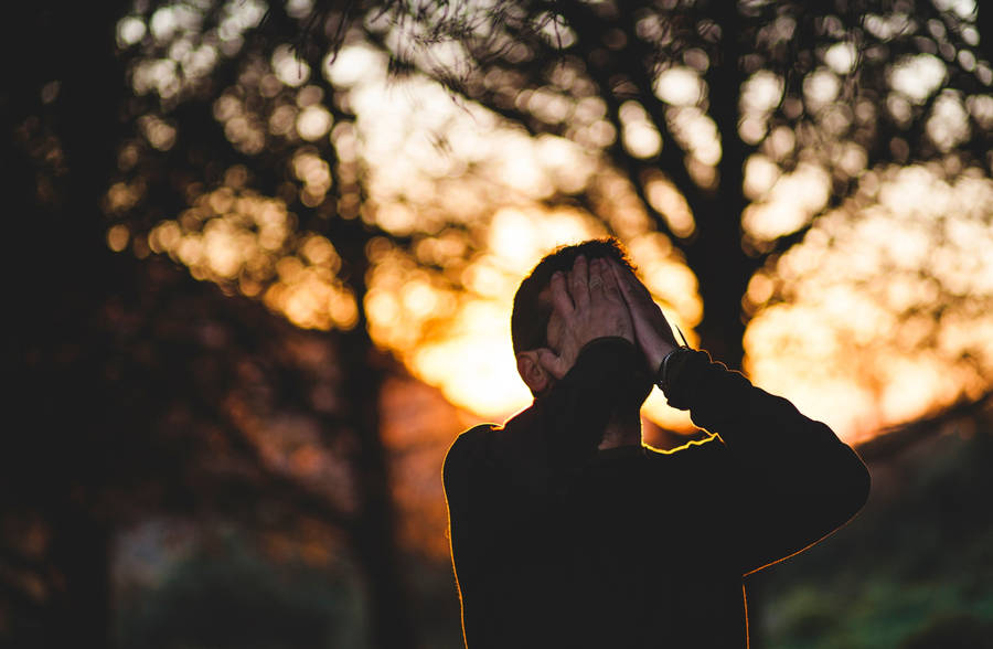 Man Covering Face Sad 4k Wallpaper