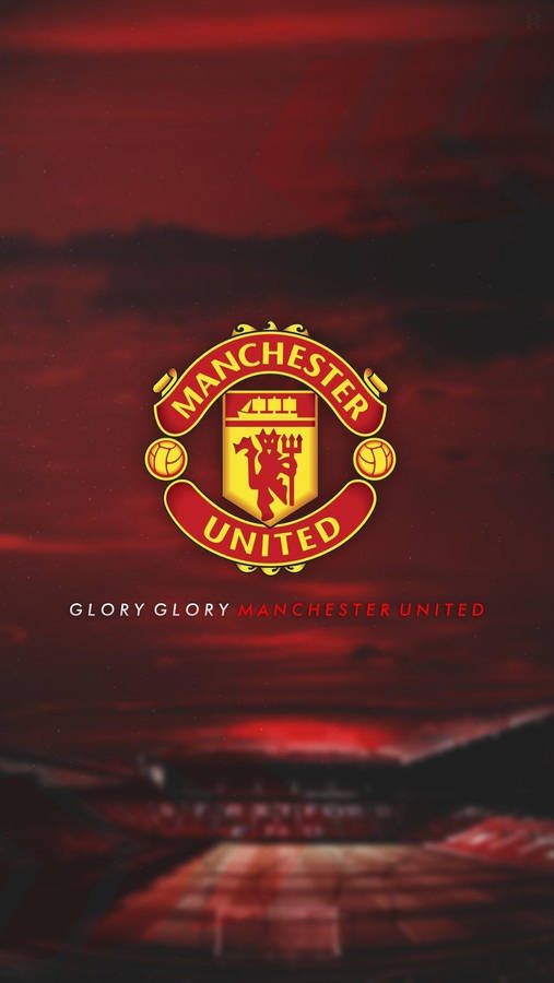 Manchester United Emblem With A Fiery Background Wallpaper