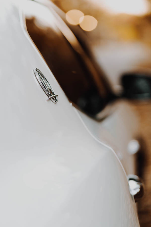 Maserati Metal Emblem Wallpaper