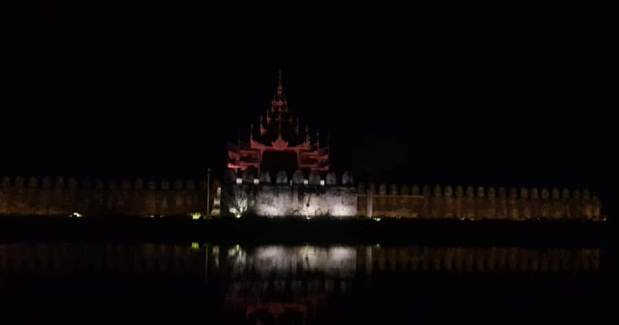 Masonry Screens Of Mandalay Palace At Night Wallpaper