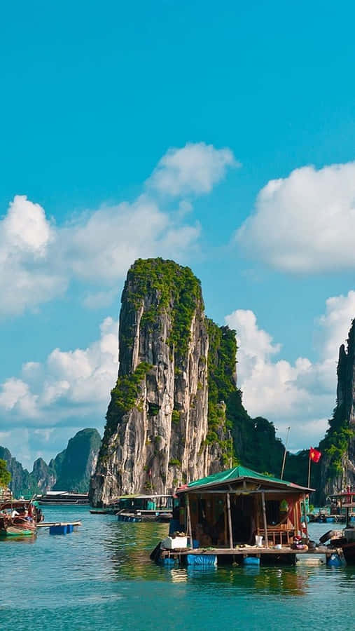 Massive Rock Formations In Halong Bay Wallpaper