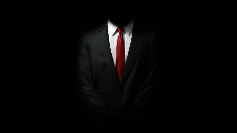 Master Assassin Agent 47 In Hitman Black Wallpaper