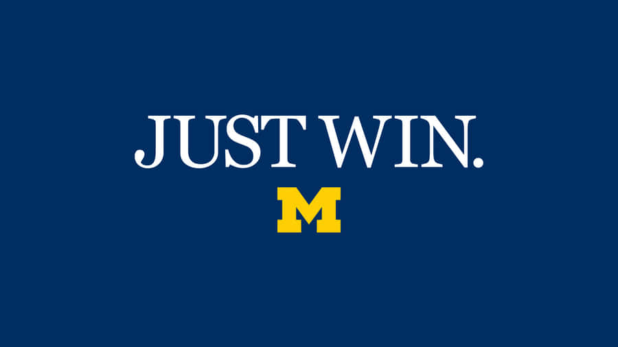 Michigan Wolverines Football Team Charging Onto The Field Wallpaper