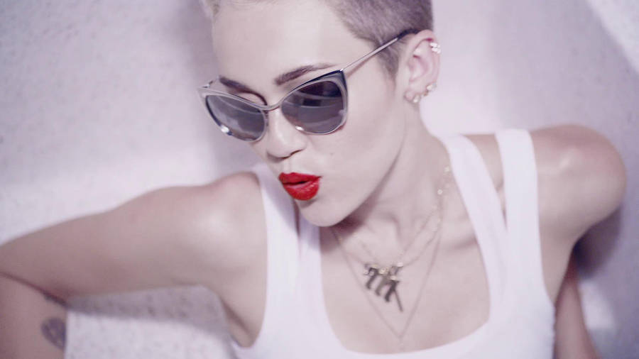 Miley Cyrus's Unstoppable Momentum Wallpaper