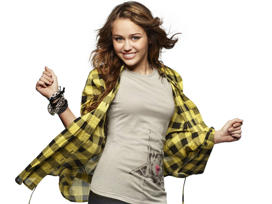 Miley Cyrus Shines In A Bright Yellow Flannel Wallpaper