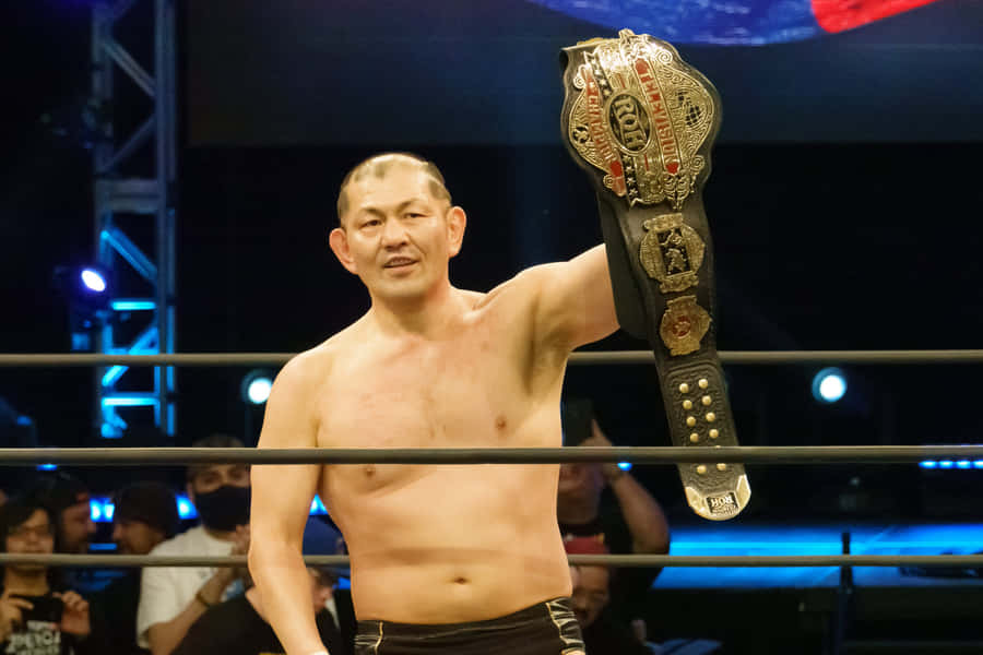 Minoru Suzuki Champion Belt Victory Pose Wallpaper