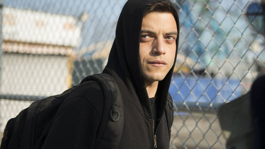 Mr. Robot Elliot Near Steel Fence Wallpaper