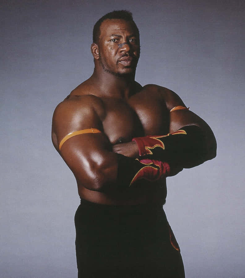Muscled Wrestler Pose Wallpaper