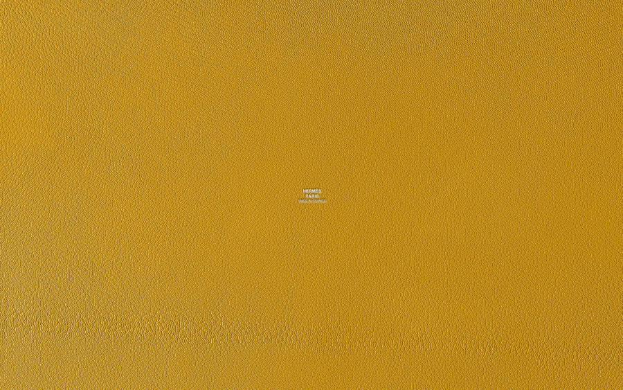 Mustard Yellow Textured Hermes Wallpaper