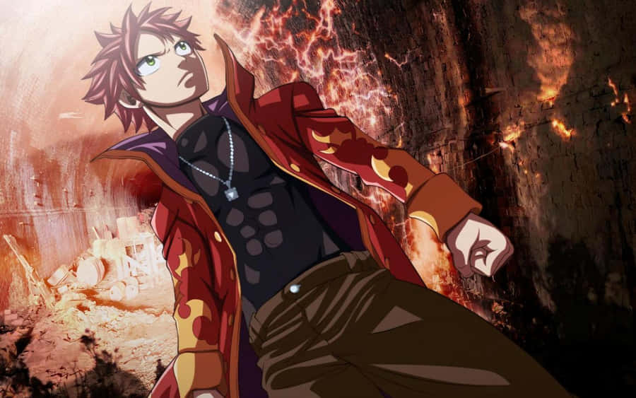 Natsu Dragneel Unleashing Flames In Battle Wallpaper