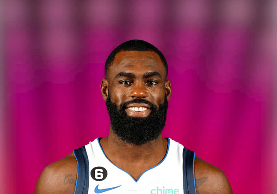 Nba Star Tim Hardaway Jr. Poster Wallpaper