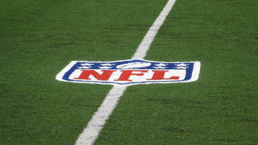 Nfl Football Logo On Field Wallpaper