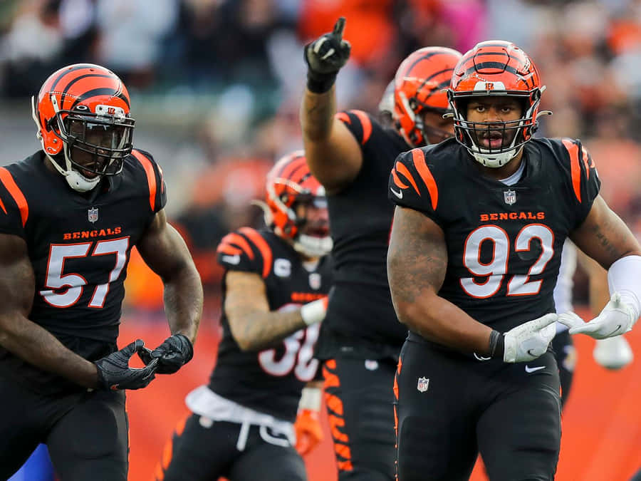 Nfl Players Bj Hill And Germaine Pratt Medium Full Shot Wallpaper