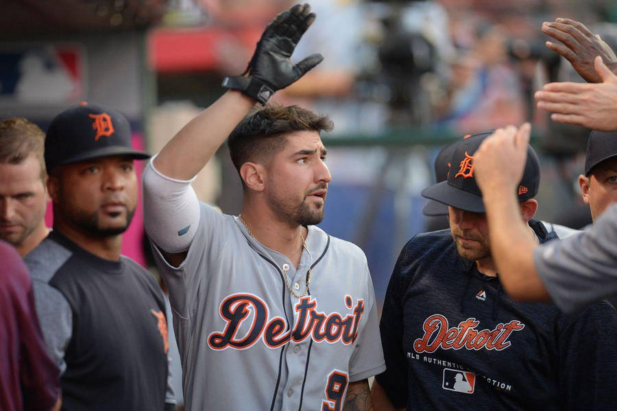 Nick Castellanos Raises A Gloved Hand Wallpaper