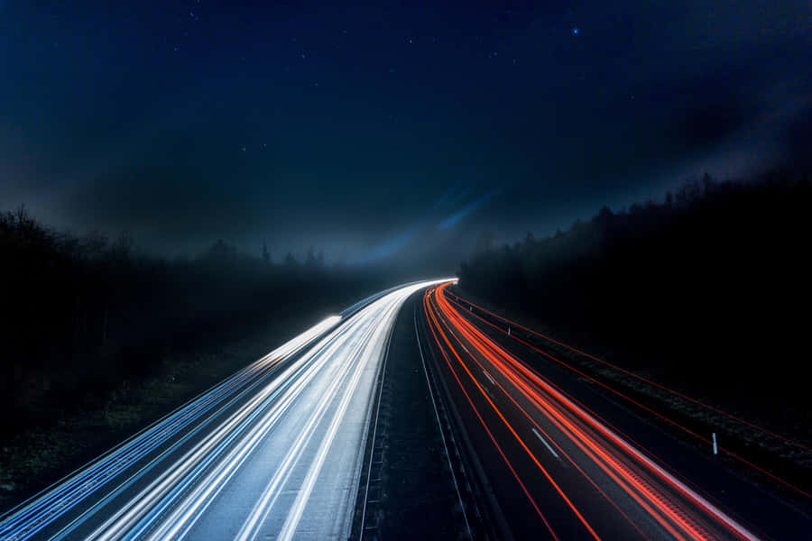 Nighttime Highway Long Exposure Wallpaper