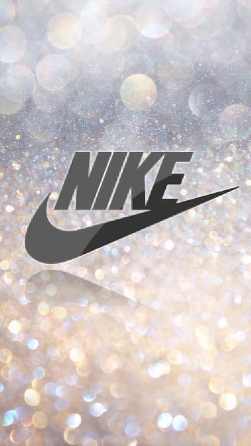 Nike Logo On A Glittery Background Wallpaper