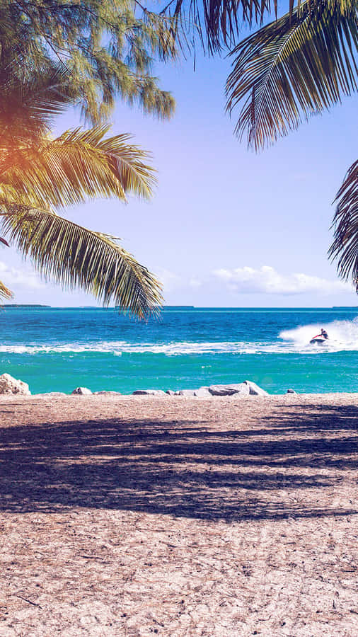 Nothing Beats Enjoying Summer On The Beach With Your Iphone Wallpaper