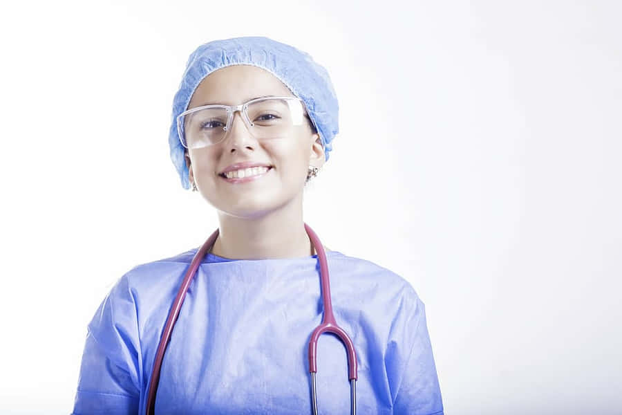 Nursing With Personal Protective Equipment Wallpaper