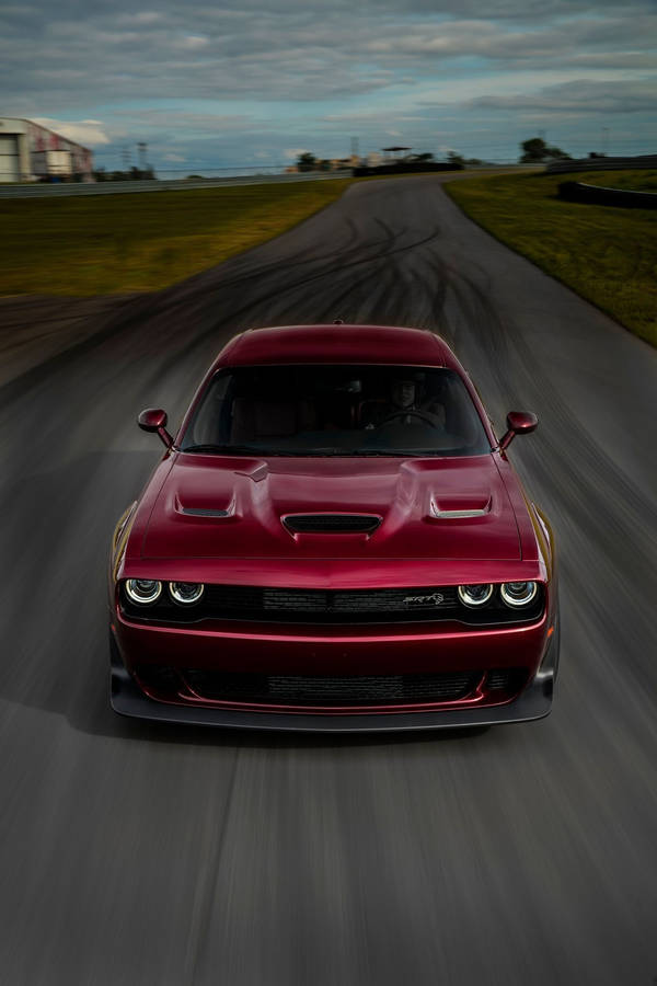 Octane Red Dodge Challenger Demon Isolated On Track Wallpaper
