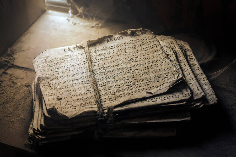 Old Paper With Song Notes Wallpaper