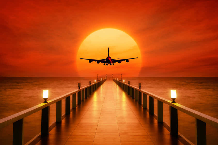 Orange Big Sunset Plane Background Wallpaper
