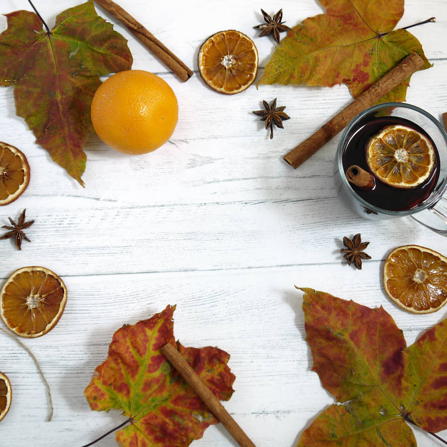 Orange Fruit Beside Clear Drinking Glass Filled With Black Liquid Wallpaper