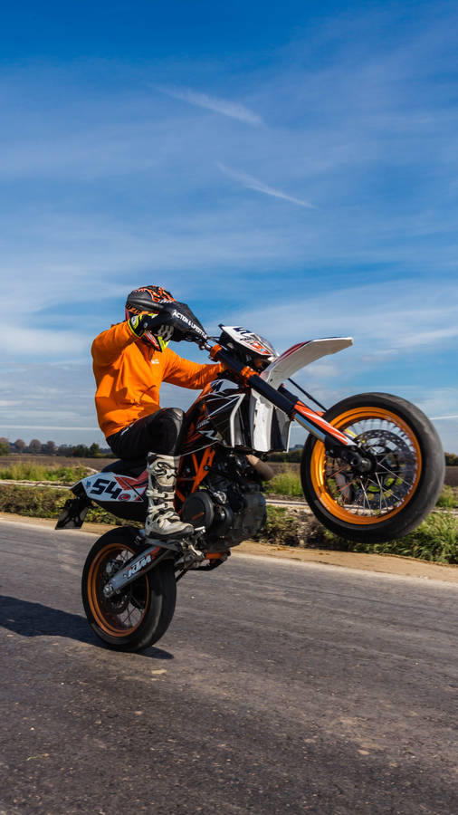 Orange Ktm 4k Biker On Track Wallpaper