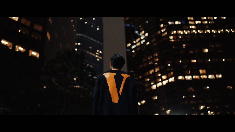 Orange Vlone Logo In The City Wallpaper