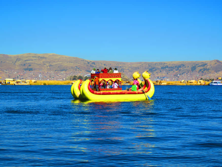 Painted Reed Boat Tour On Lake Titicaca Wallpaper