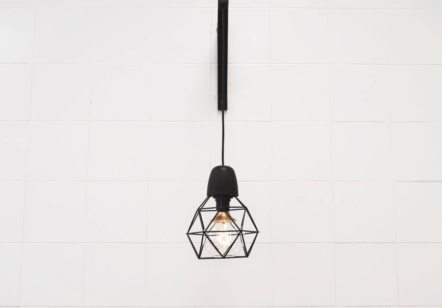 Pendant Lamp Hanged On White Room Wallpaper