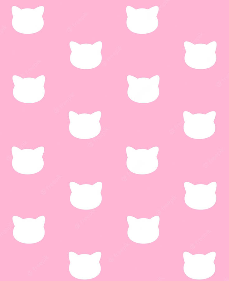 Pink Cat Sitting Near A Table Wallpaper