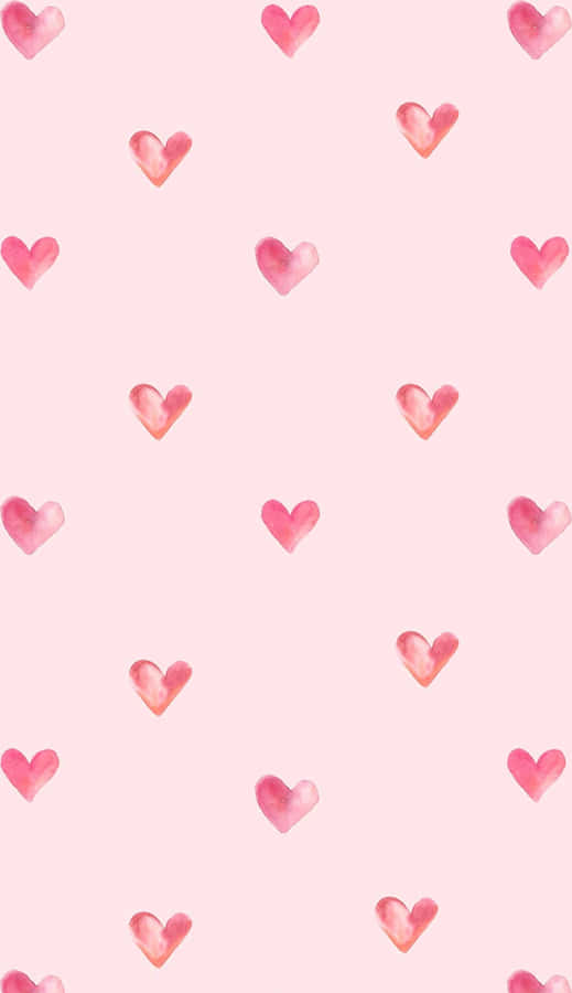 Pink Hearts On A Pink Background Wallpaper
