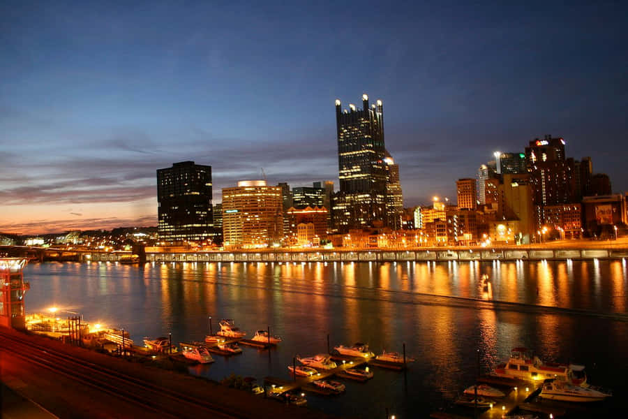 Pittsburgh Skyline With Boats Wallpaper