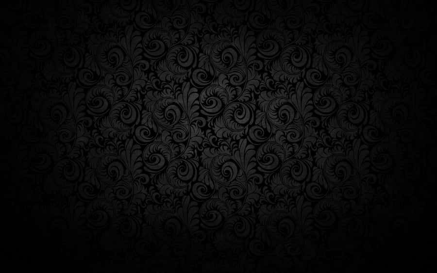 Plain Black Desktop With Swirling Leaves Wallpaper