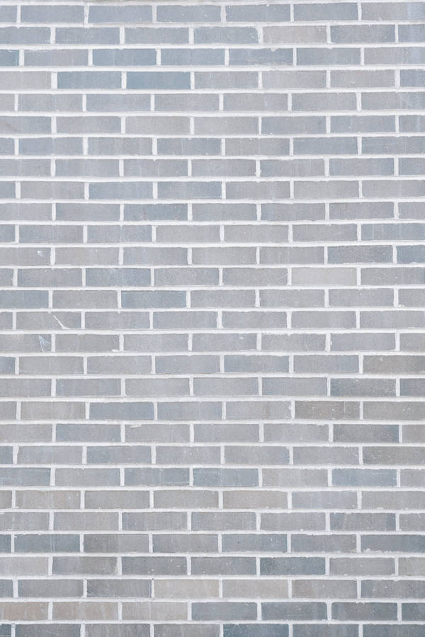 Plain Grey Brick Wall Portrait Wallpaper