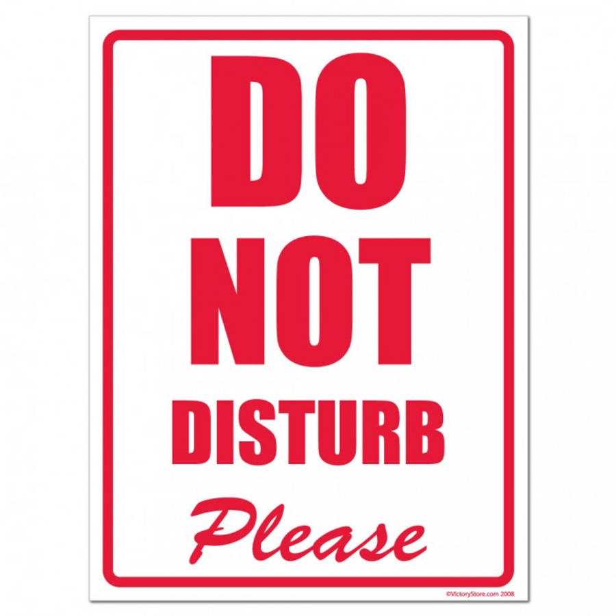 Please Do Not Disturb Sign Hanging On A Door Wallpaper