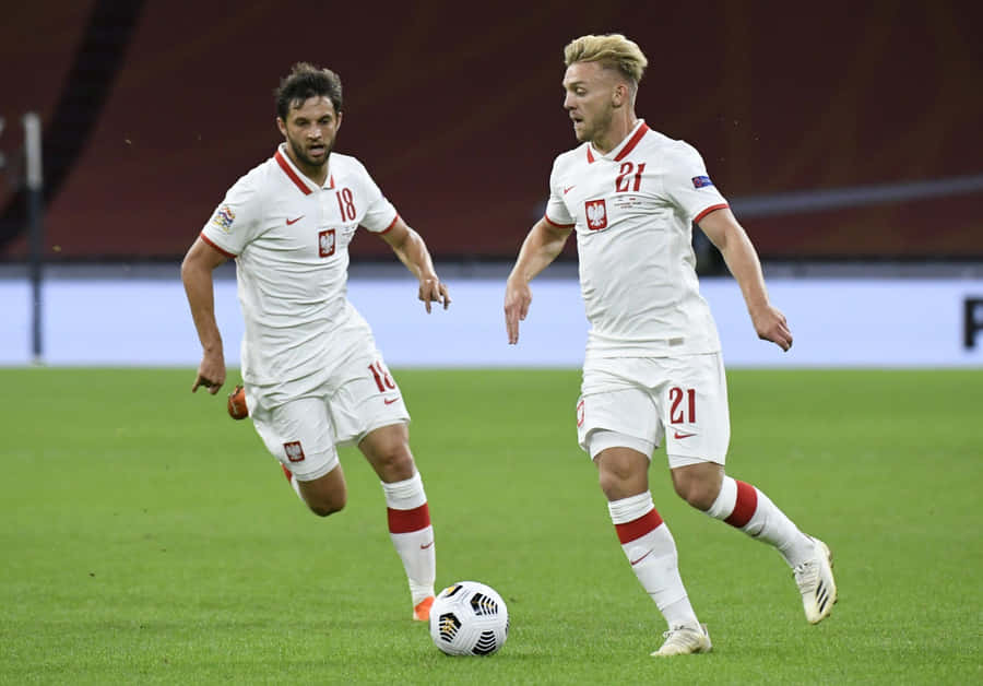 Polish Soccer Playersin Action Wallpaper