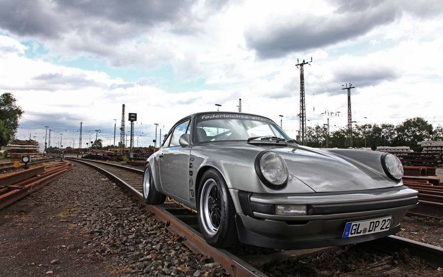 Porsche 911 On Train Tracks Wallpaper