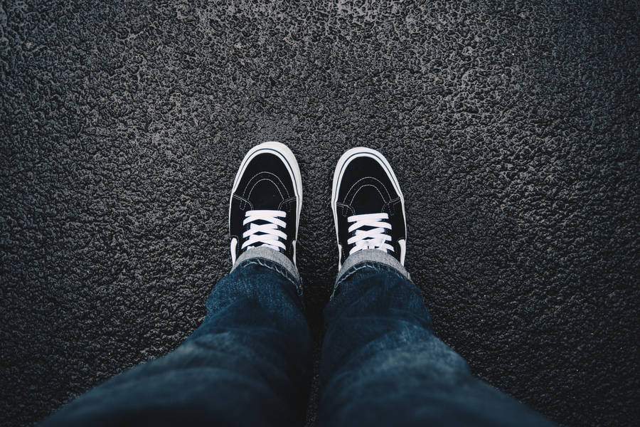 Pov Black Vans On Asphalt Wallpaper