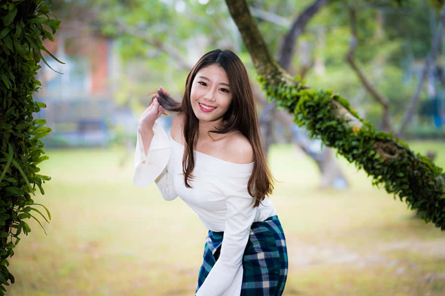 Pretty Asian In Park Wallpaper