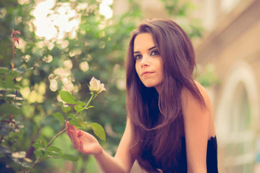 Pretty Teen Girl In Garden Wallpaper