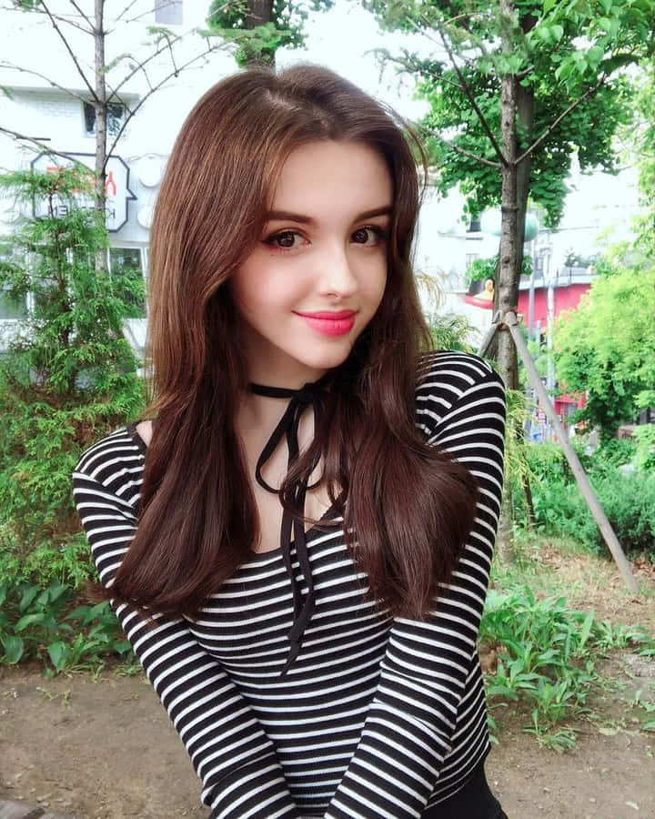 Pretty Teen Girl In Stripes Wallpaper